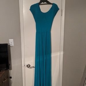 Turquoise maxi with criss cross cut out in back.